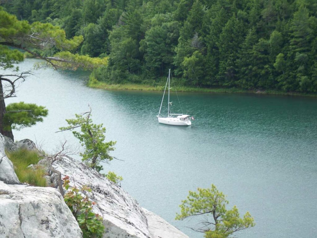 The Middlebrooks took this photo of their 34-foot cruiser ‘Nyala’ at anchor in a North Channel cove as they hiked onshore. By Isobel Harry.