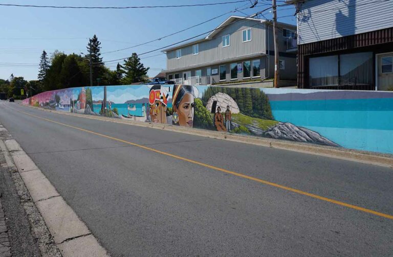 This mural in downtown Little Current represents the community’s evolution. Photo courtesy of SA•WAT•SKI Concept Reality.